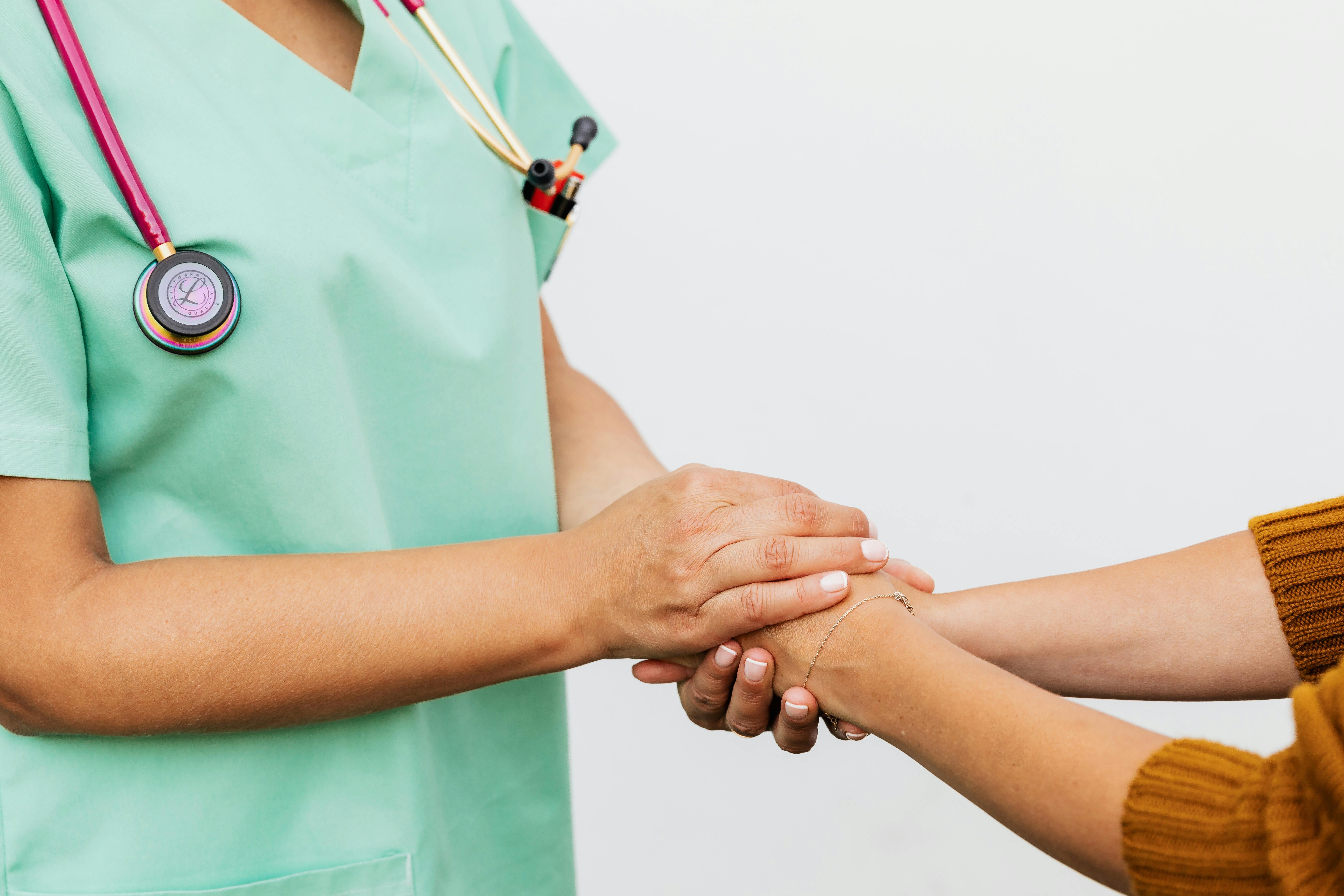 Healthcare provider discussing chronic condition management with patient