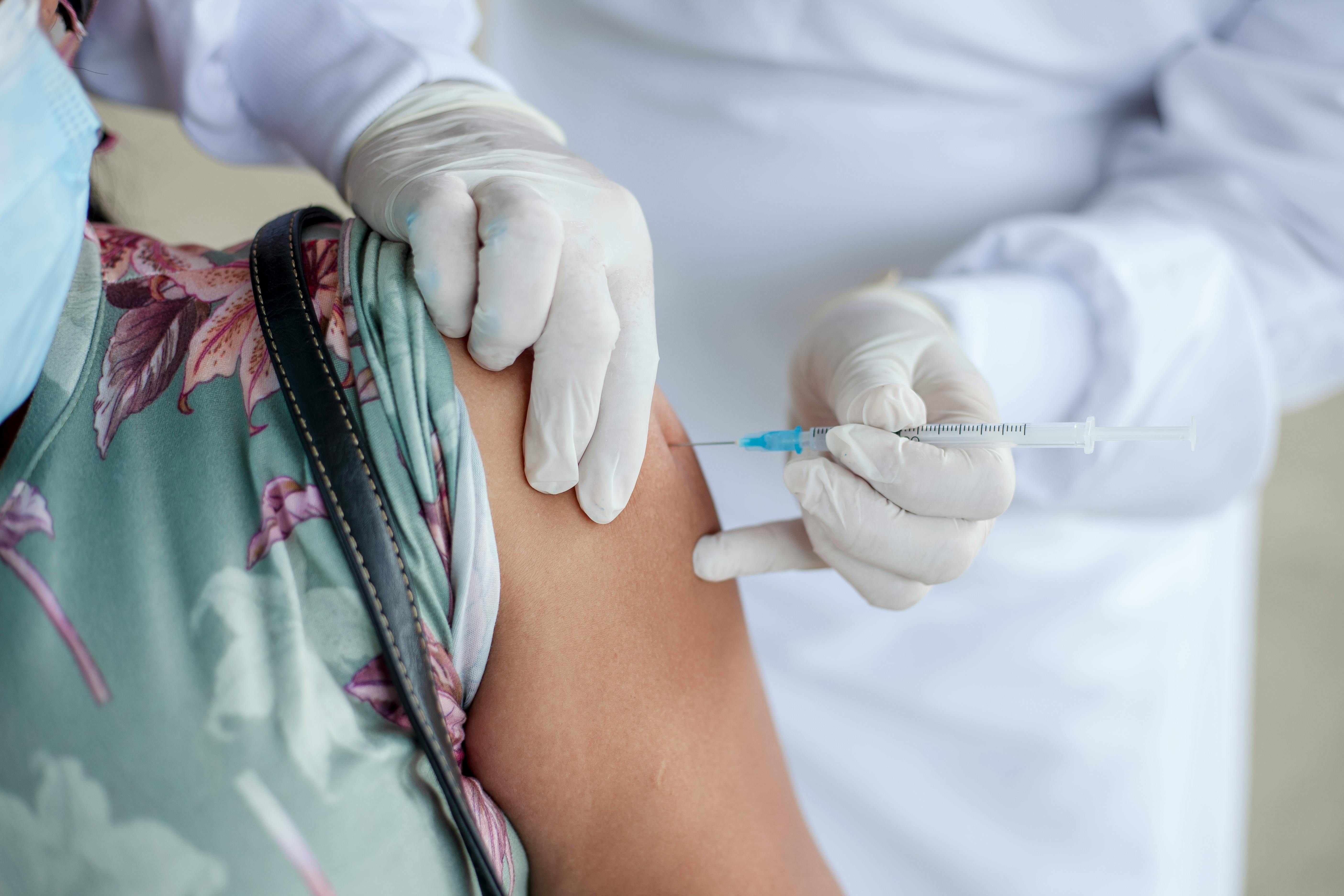 Healthcare provider administering vaccine